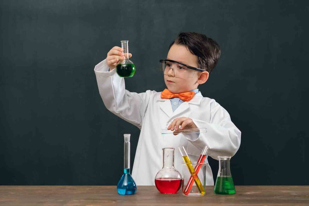 Young boy using a chemistry set
