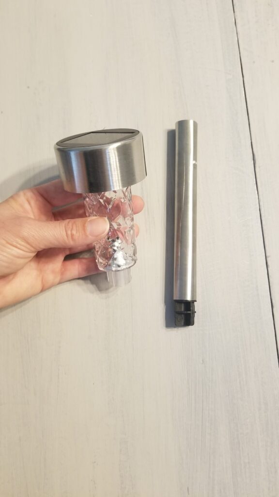 solar light and its stem lying next to it