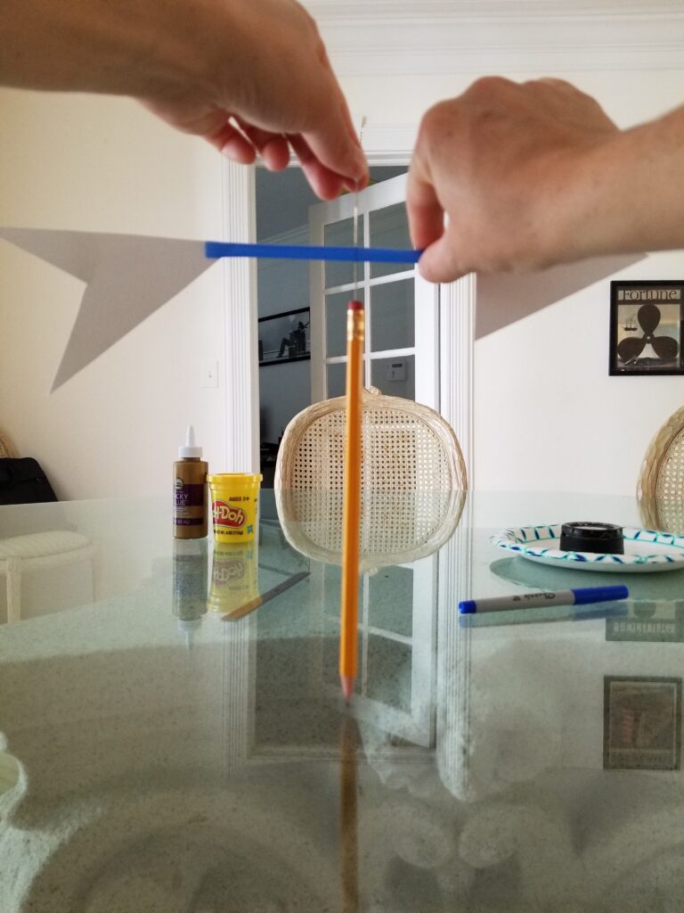 stick pin into eraser of pencil