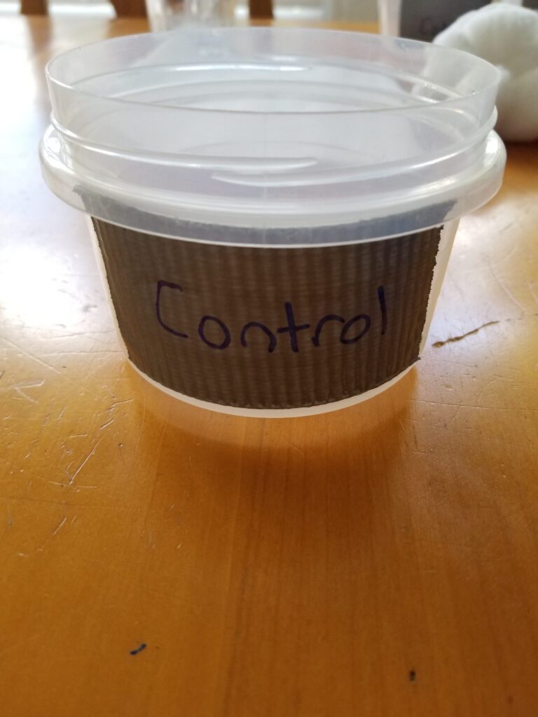 A food container with control labeled on it