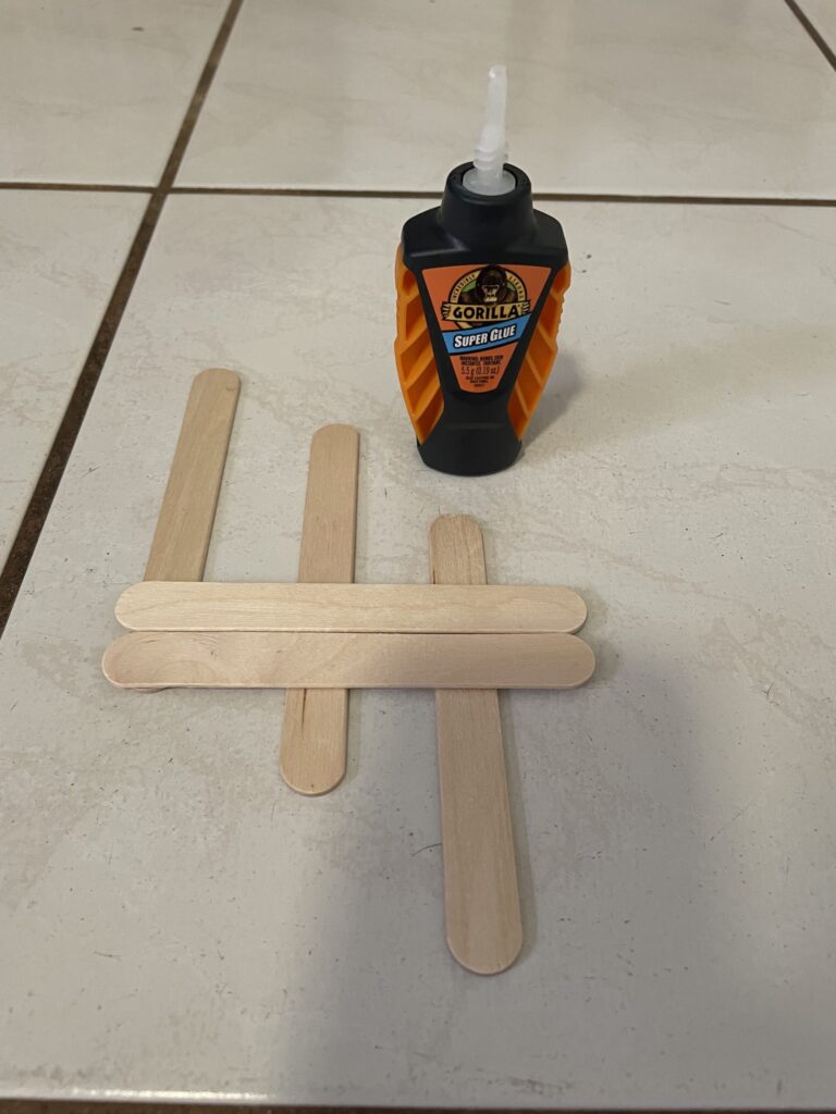 Popsicle sticks glued together with glue