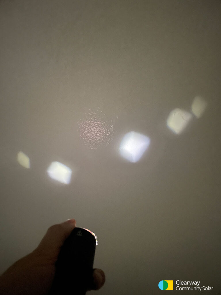 Clearway Science Experiment - DIY Constellation - Step 7: Turn off lights and point flashlight at wall