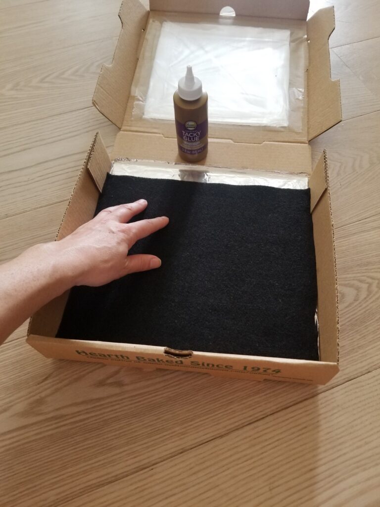 box with black paper