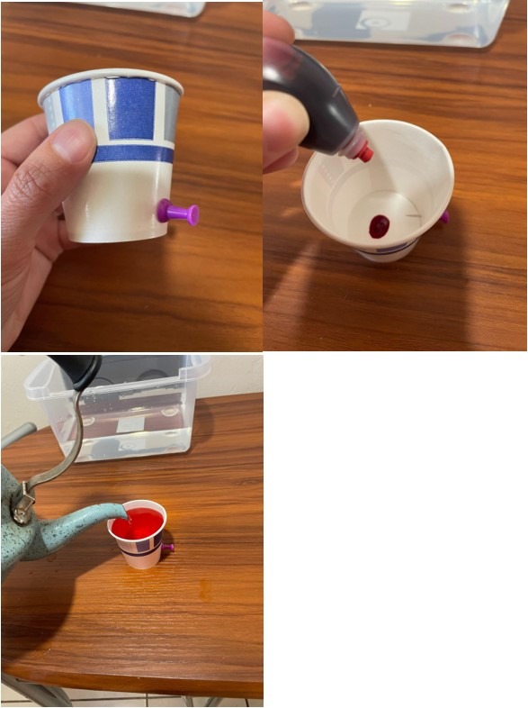 A cup with thumbtack in it and a kettle pouring red water into a cup